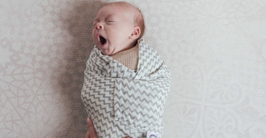 Baby sleep training / guidance swaddled and secure