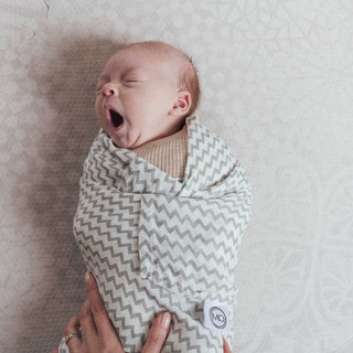 Baby sleep training / guidance swaddled and secure