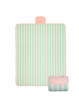 Flat lay and Folded compact play mat with handle and logo detail – toddlekind portable water resistant wander grande play mat capri for portability.  Alt Img