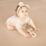 Baby crawling with a teether toy on the toddlekind baby toddler foam modern designer puzzle play mat haven deco latte
