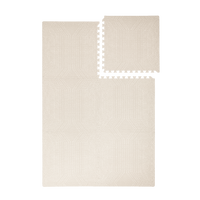 Interlocking foam tiles with one tile removed from toddlekind baby toddler foam modern designer puzzle play mat haven deco ecru.