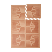 Interlocking tiles arranged in a grid with one corner lifted showing the toddlekind baby toddler foam modern designer puzzle play mat haven linear camel.
