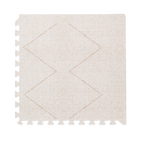 Close-up of a single textured tile with subtle diamond pattern from the toddlekind baby toddler foam modern designer puzzle play mat haven tulum bone. Alt Img