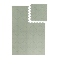 Interlocking tile layout with one piece removed showing the toddlekind baby toddler foam modern designer puzzle play mat haven tulum agave.