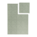 Interlocking tile layout with one piece removed showing the toddlekind baby toddler foam modern designer puzzle play mat haven tulum agave.